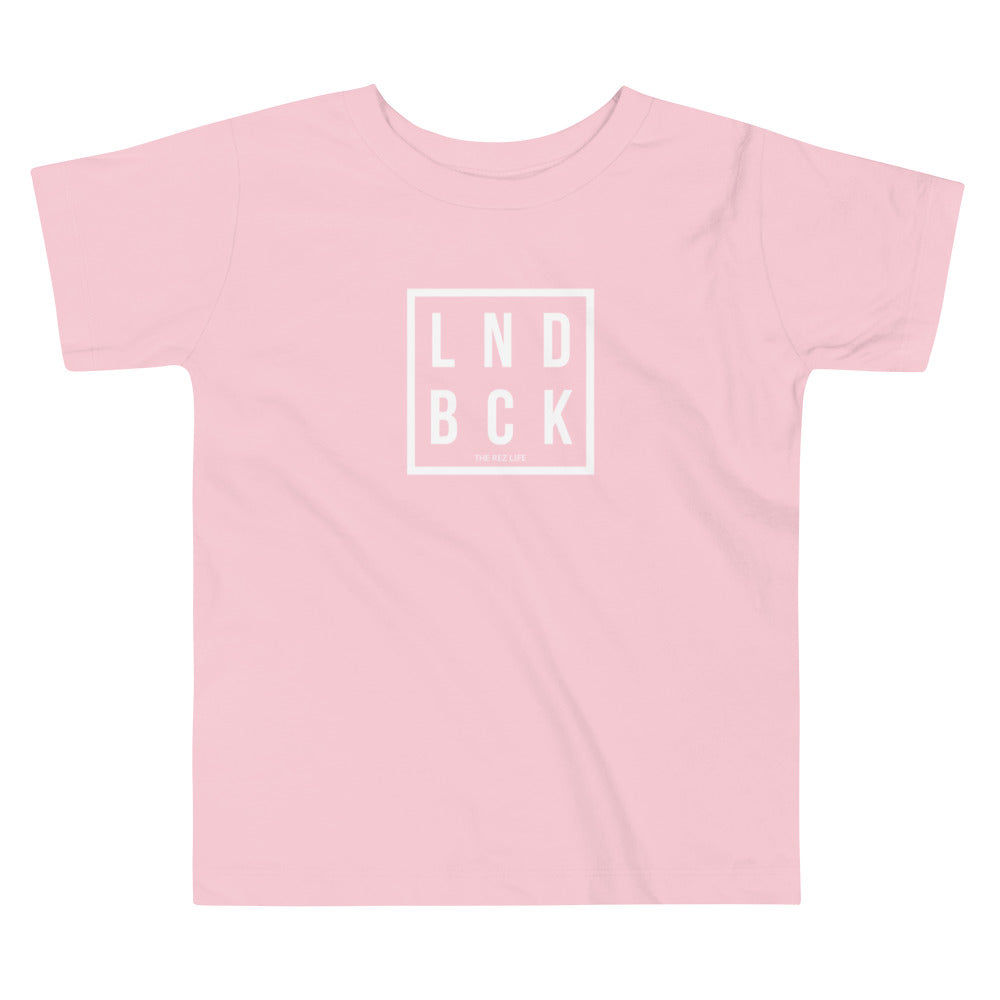 Just Out Here Tryna Get Our LND BCK Toddler Tee