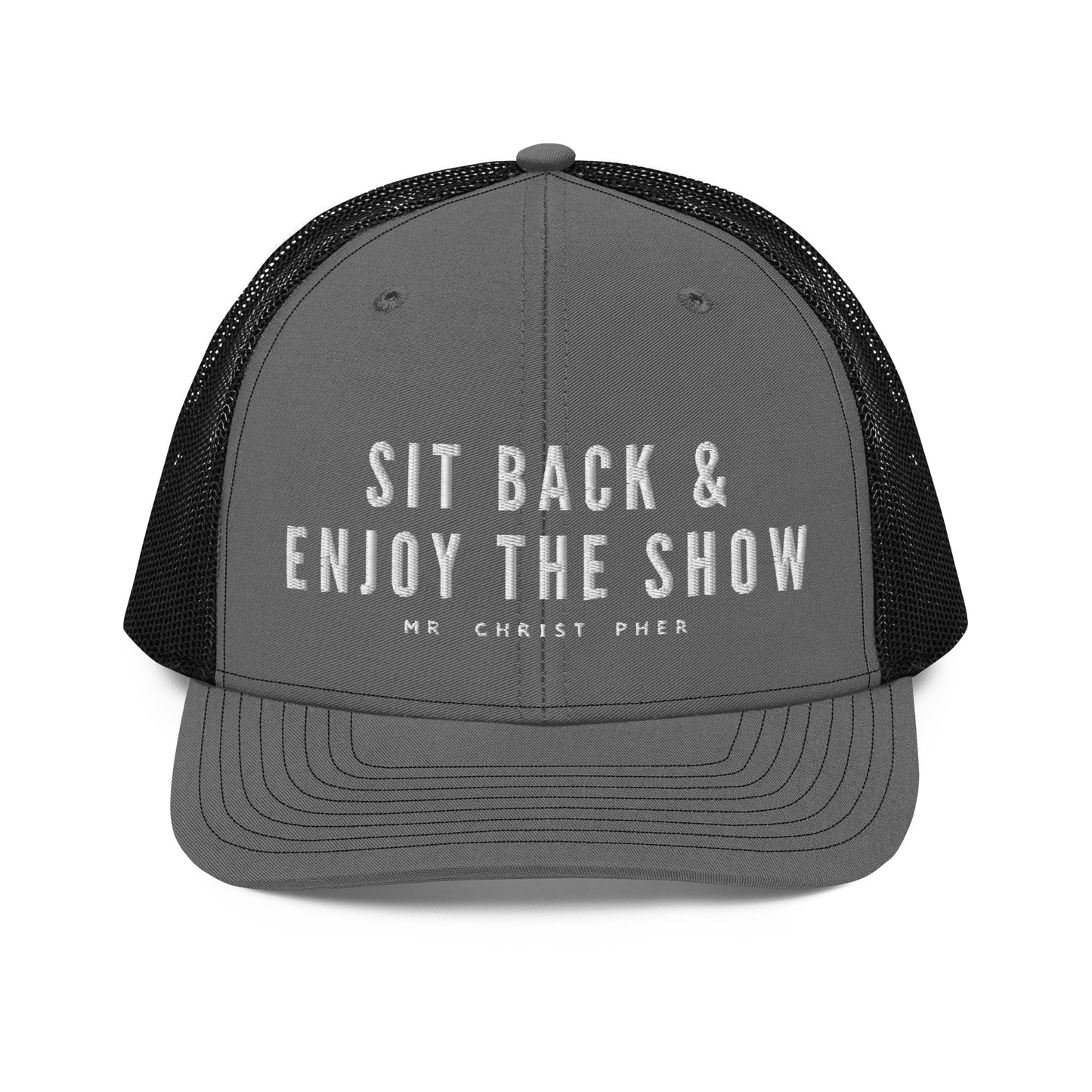 Sit Back & Enjoy The Show by @Mr.Christ0pher Trucker Hat