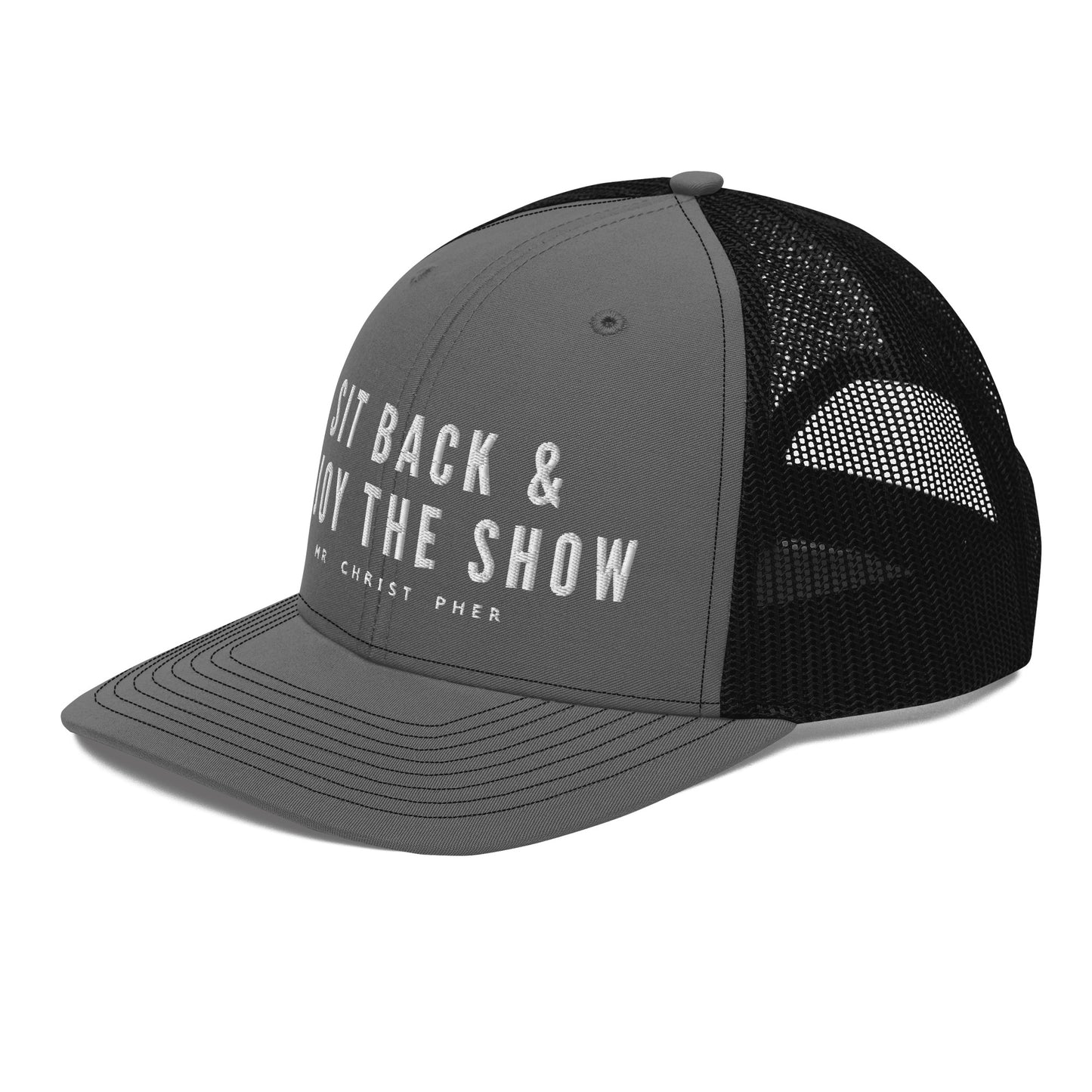 Sit Back & Enjoy The Show by @Mr.Christ0pher Trucker Hat